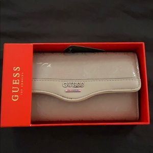 brand new mauve colored GUESS wallet